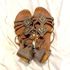 Sequined sandals by Maurice’s. Lightly worn. No holes, tears, or stains.